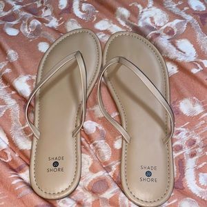 Nude flip flops